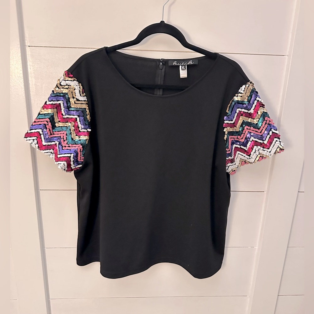 Anthropologie Black Top with Multicolor Sequin Chevron Sleeves